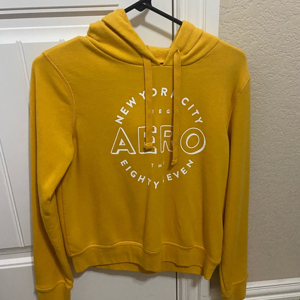 yellow sweatshirt